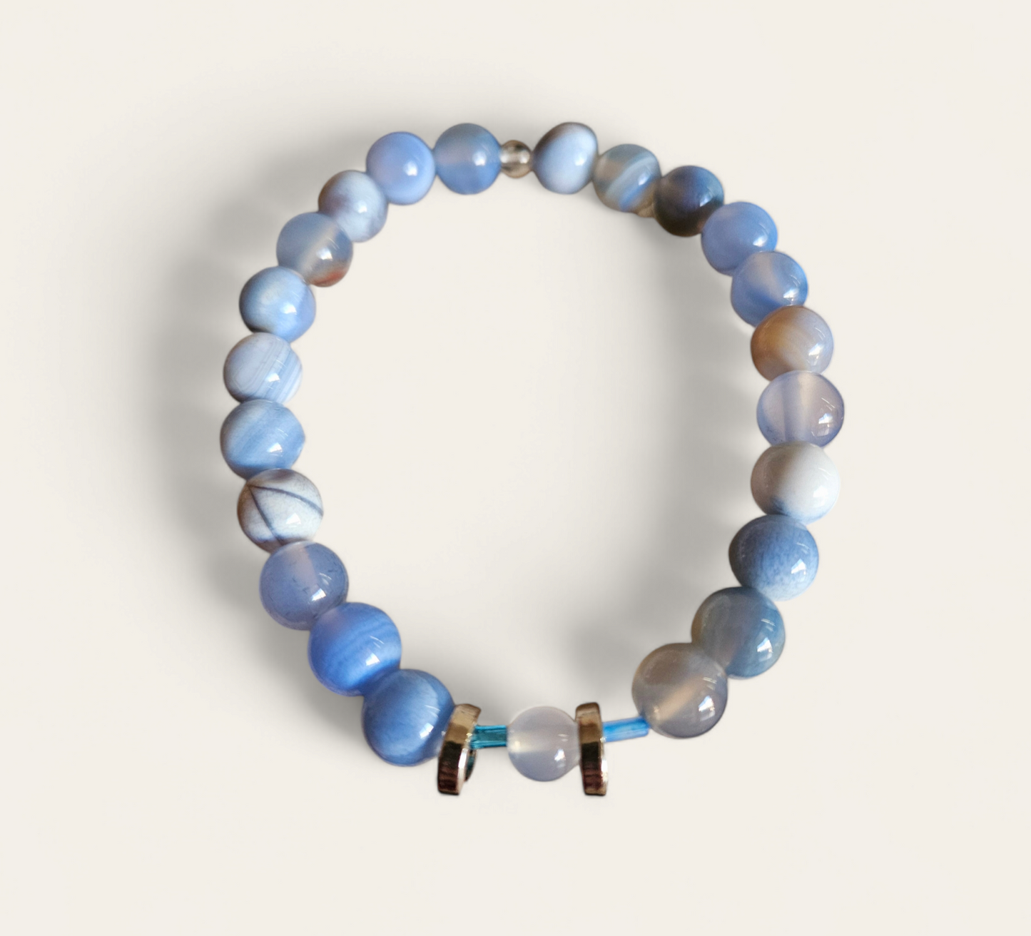 Blue stone bracelet with silver slider spacers, stretch